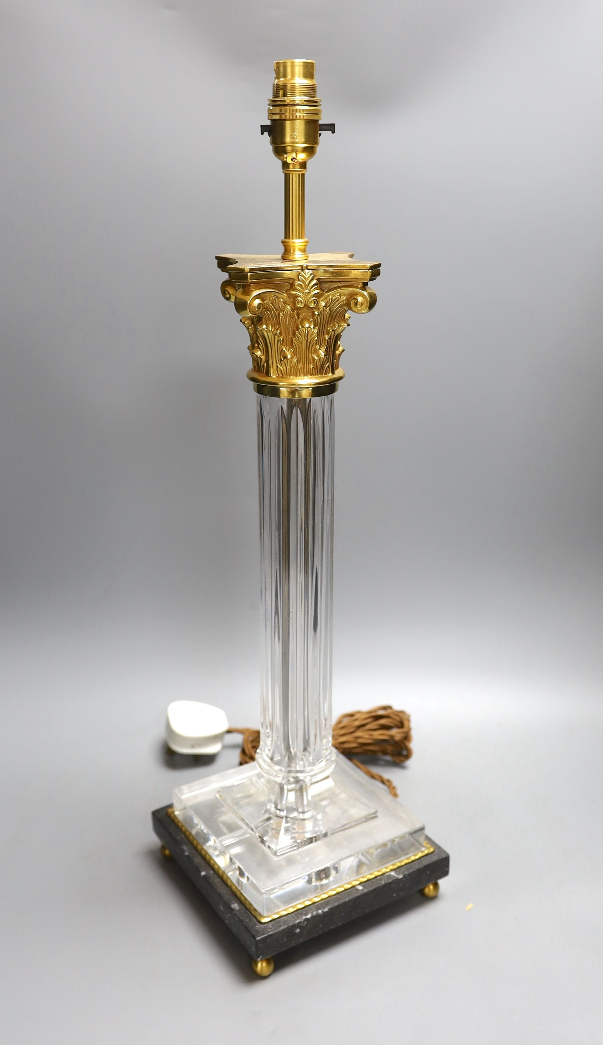 An ormolu and glass table lamp - 58cm tall